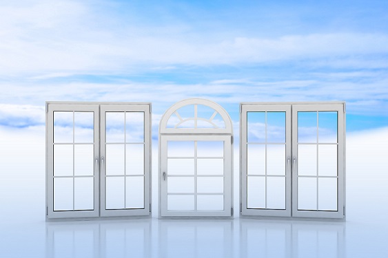 White windows with blue sky and clouds on the background