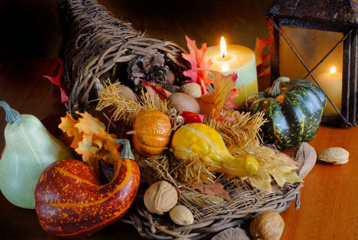 Thanksgiving still life with cornucopeia and candles